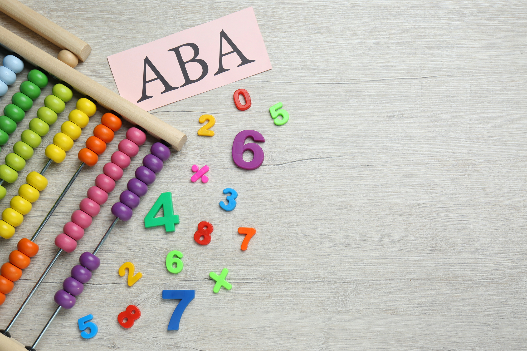 aba therapy center table with letters and numbers on it