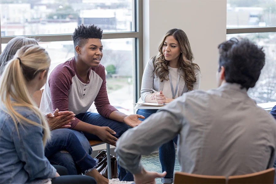 clinic that used our eating disorder treatment marketing services holding a group therapy session