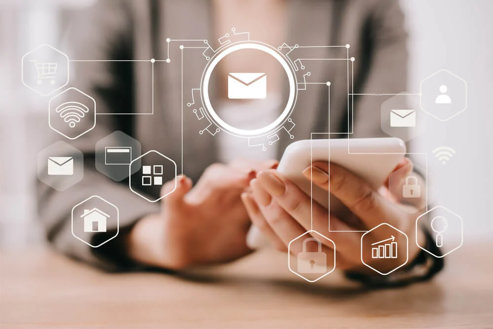 cropped view of businesswoman using online tools for email marketing