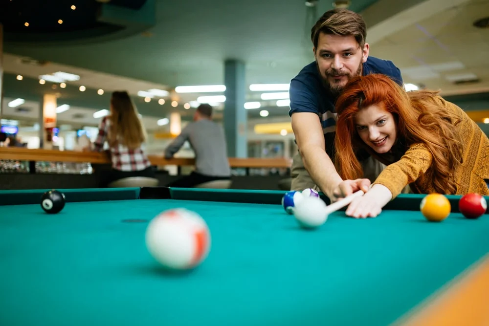 Sober Bars: A Fun And Safe Venue For Continued Sobriety 3 enjoying playing pool in sober bar