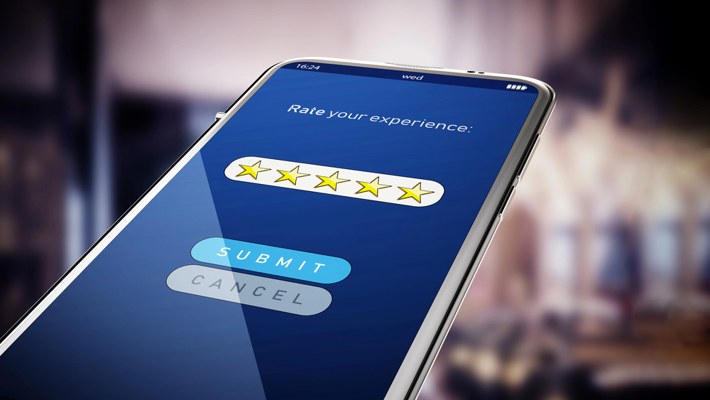 leveraging testimonails and getting permission to use testimonials, a concept image with a phone showing rating experience